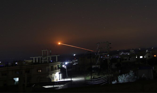 ISRAEL STRIKES THREATS ON TWO FRONTS
